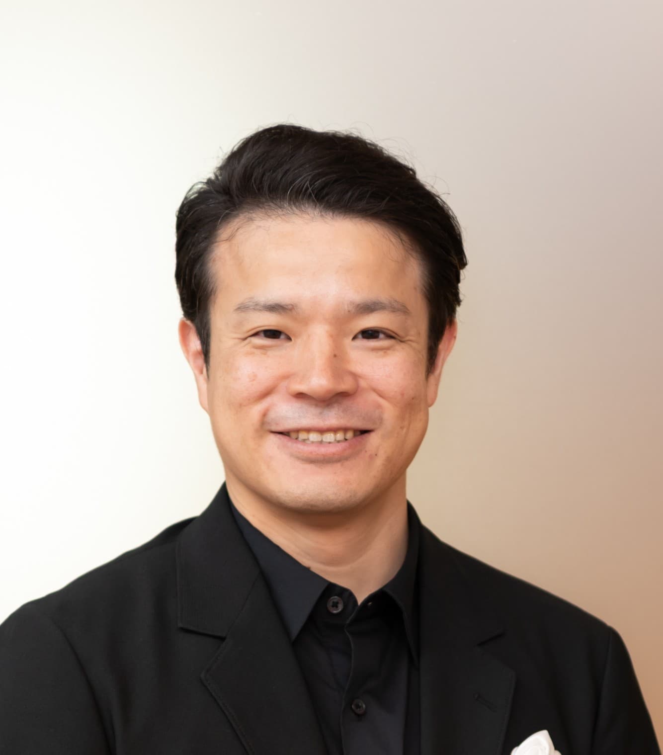 手塚 究