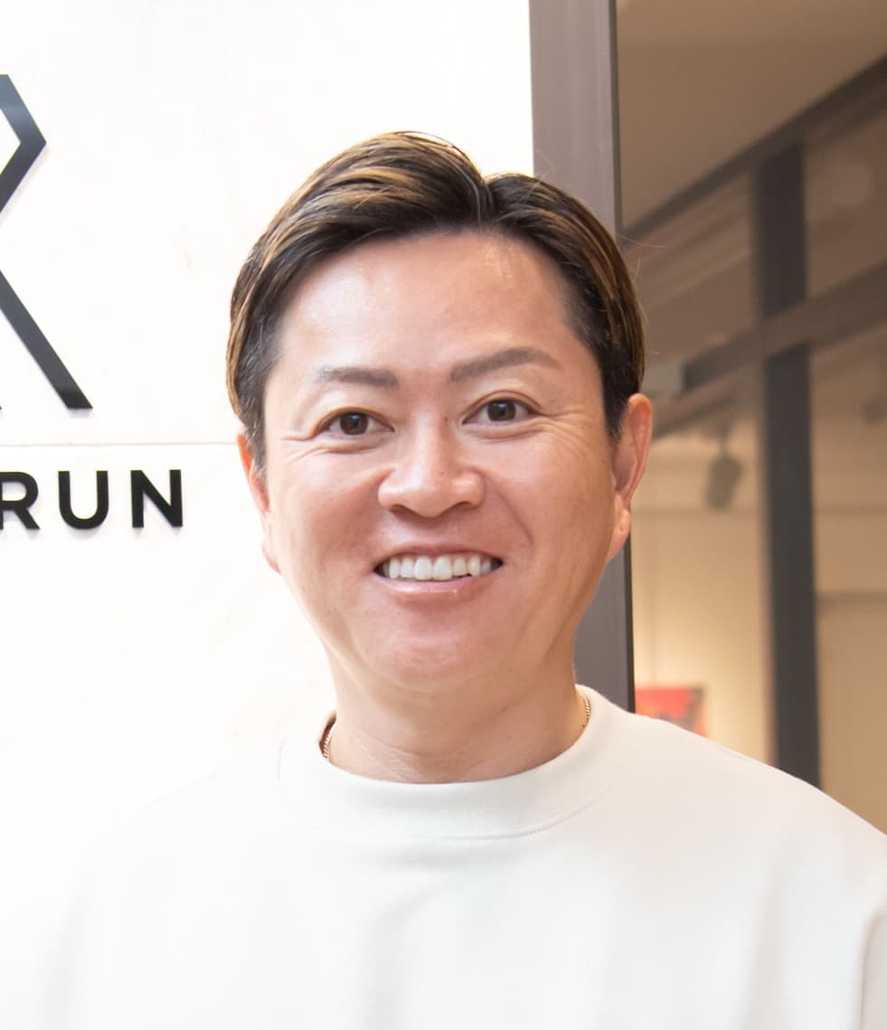 都築 学